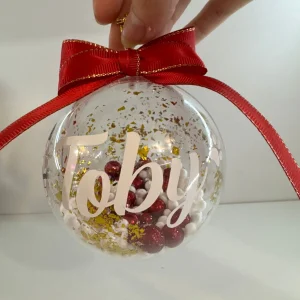 🎄❤️ Esfera 8cm Personalizada con Nombre/frase a elegir, decorada con escarcha y simulación nieve, Moño Rojo o dorado ❤️🎄